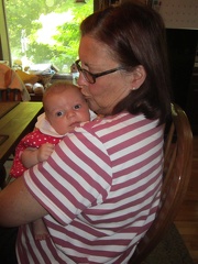 Greta and Grandma Carriere at the kitchen table